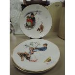 A selection of collectors plates with Norman Rockwell prints