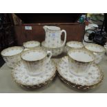 A part tea coffee service by Spode in the Fleur De Lys Gold pattern