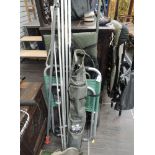 A selection of fishing and tackle related items including trolley rods etc