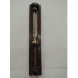 A brass thermometer scale, by Short & Mason, London, number 110/96T on treen stand