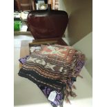 A selection of bohemian style fabrics and throws