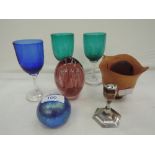 A selection of miniature decorative items including pink glass paper weight