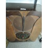 A vintage Philco radio in treen case.