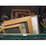 A large box of pictures, prints and frames.