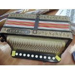 A vintage Hohner one row button accordion