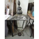 A cast framed lamp top with finial.