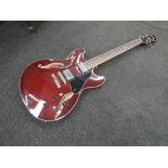 An Ibanez A573-TCR hollow body electric guitar , in cherry red, serial number to inner label ,