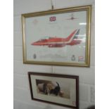 A print of a Hawk T1A signed by the Red Arrows and another print of puppies.