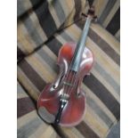 A traditional 3/4 size fiddle/violin, possibly English made, having two piece back, chin rest