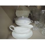 A selection of vintage ceramics by Belleek including display plate, tureen and gravy boat