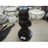 A very heavy metal cast and marble base wise old owl with an appealing green tint