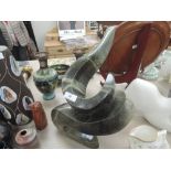 A stone carved art sculpture of modernist form in a Barbara Hepworth style very heavy very tacktile