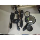 A selection of Ebony dressing table items