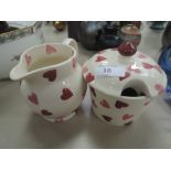 A selection of ceramics by Emma Bridgewater cream and hearts pattern