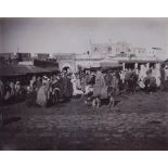 TANGIER group of nineteen photographs attributed to Cavilla showing a local market, horse racing and