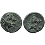 Apulia, Tarentum, Bronze, c. 275-200 BC; AE (g 1,76; mm 12; h 6); Forepart hippocamp r., Rv. Head of