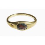 Roman gold finger ring with garnet Intaglio 1st – 2nd century AD; diam. 15 mm; gr 1,10; Roman gold