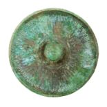 A Greek omphalos phiale in bronze5th – 4th century BC; diam. cm 19,5; alt. cm 3; A bronze phiale