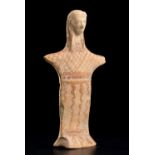 A Boeotian Terracotta figure of a GoddessMid 6th century BC; alt. cm 17,4 ; The solid hand-made body