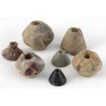 A collection of spindle whorlsIron Age; alt. max mm 34; Group of seven spindle whorls made in