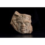 Roman antefix with the head of Silenus1st century BC – 1st century AD; alt. cm 12; A section of an