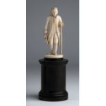 “Jean Jacques Rousseau". A carved ivory figure - France, 19th Century; ; on a wooden base. 18.4