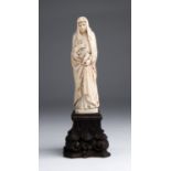 "Saint Therese". A carved ivory figure - France, 19th Century; ; with traces of original gilding and