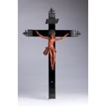 A carved coral Crucifix  - Trapani (Italy), late 17th Century; ; on a later wooden cross. 41 cm,