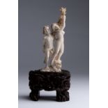 "Apollo & Daphne". A carved ivory figural group - J. Wells, France / Belgium, 19th Century; ; signed