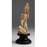 A carved ivory figure of a "Risorgimento" soldier - Italy, late 19th Century; ; on a wooden base.