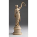 A carved ivory figure of a young lady - France, late 19th / early 20th Century (pre-1947); ; on a