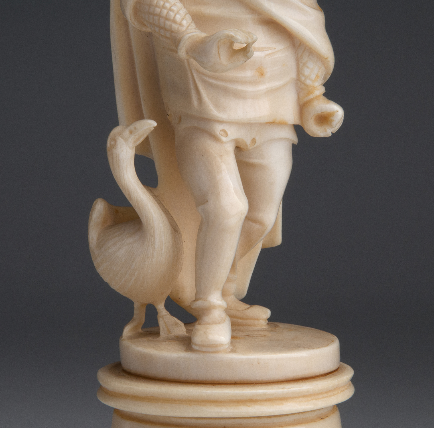 A carved ivory figural group of male figure with a goose - probably France, late 19th / early 20th - Image 7 of 9