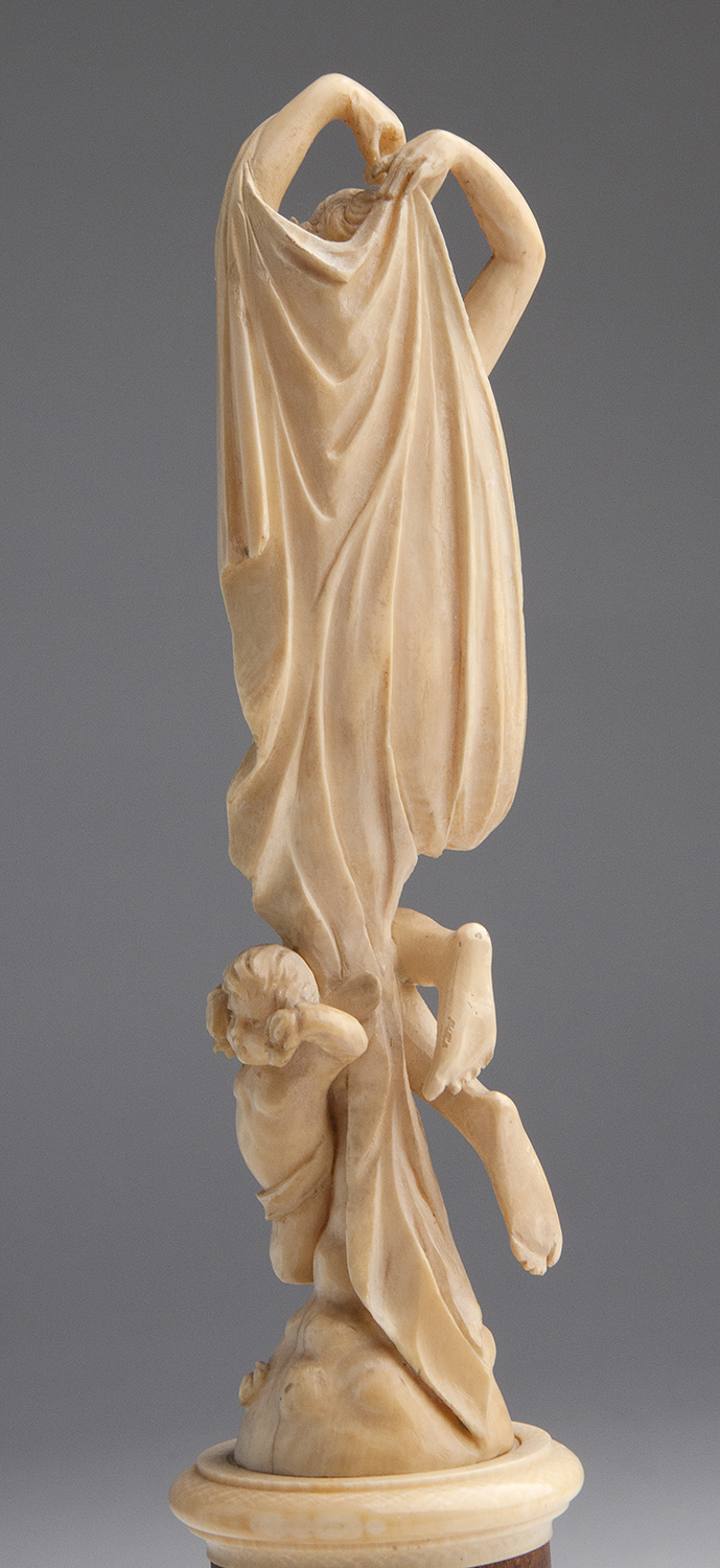 A carved ivory allegorical female figure - France, late 19th Century; ; on a ivory and wood base. - Image 5 of 6