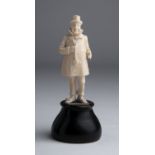“Wilkins Micawber”. A carved ivory figure - England, late 19th Century; ; labelled: "Micawber", on a
