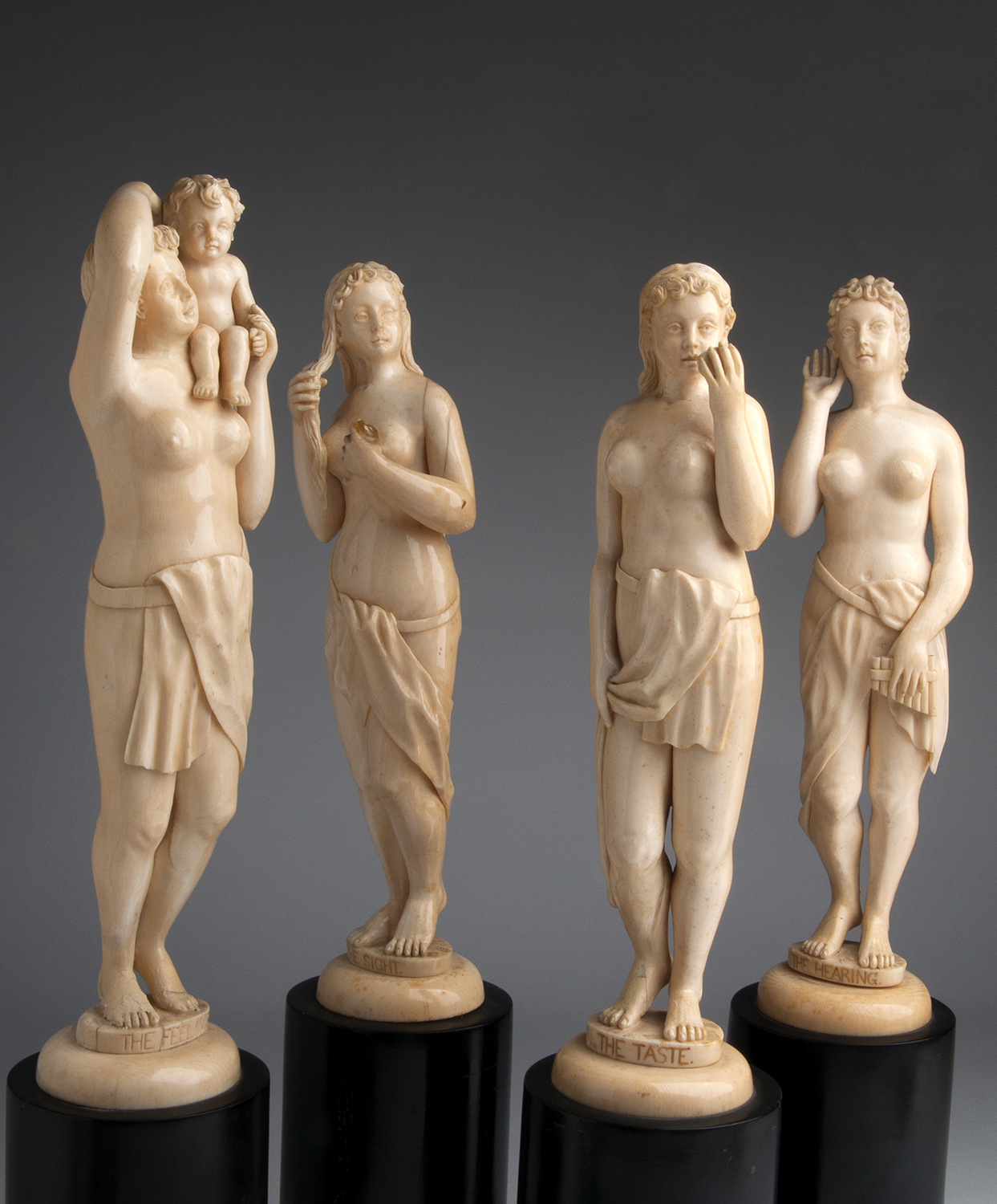 A carved ivory group of four female figures depicting "The Sight", "The Hearing", "The Taste" and " - Image 4 of 8