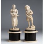 A pair of carved ivory figures of street musicians - Germany, 19th Century; ; on ivory and wooden