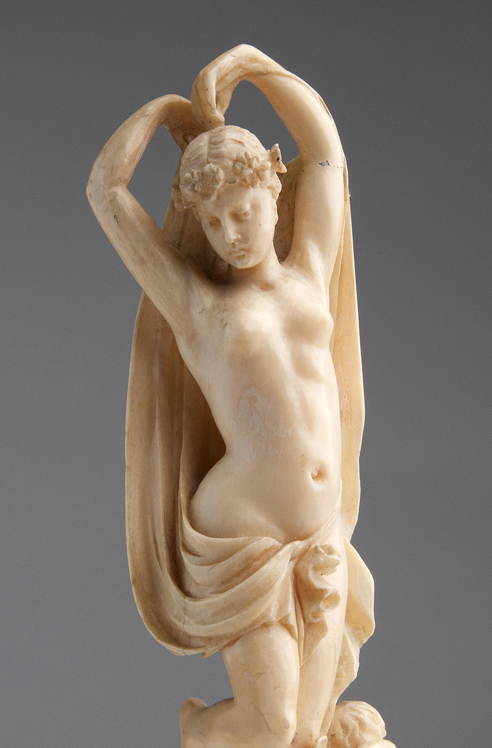 A carved ivory allegorical female figure - France, late 19th Century; ; on a ivory and wood base. - Image 3 of 6