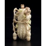 A vegetable carved ivory snuff bottle and stopper - China, 20th Century; ; finely carved peanut
