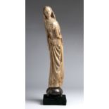 "Mary Magdalene". A carved ivory figure - probably France, 18th Century; ; with traces of original