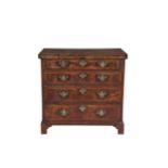 A GEORGE II INLAID WALNUT FOLDING TOP SECRETAIRE CHEST, the fitted interior raised on a chest of