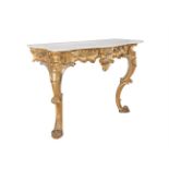 A VICTORIAN GILTWOOD MARBLE TOP CONSOLE TABLE, of serpentine form, the white marble top above carved