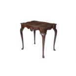 AN IRISH GEORGE III MAHOGANY SHAPED RECTANGULAR SILVER TABLE, the disked top above a serpentine