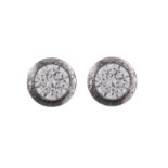 A PAIR OF EAR STUDSEach colourless round shaped stones, mounted in silver