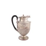 A REGENCY SILVER HOT WATER POT, London 1816, maker's mark of William Burwash, of ovoid form, with