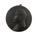 A CAST BRONZE RELIEF PLACQUE OF JOSEPH STALIN, signed 'SN, 38'
