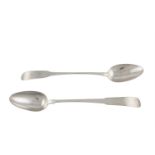 A MATCHED PAIR OF FIDDLE PATTERN IRISH SILVER BASTING SPOONS, Dublin marks c.1780 (rubbed), maker'