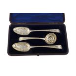 A PAIR OF GEORGE III SILVER GILT BERRY SPOONS, London 1794, mark of Solomon Hougham; together with a