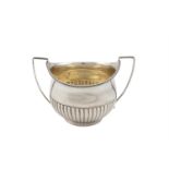 A GEORGE III CIRCULAR BALUSTER SUGAR BOWL, London 1802, mark of William Abdy, with twin reeded