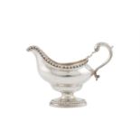 A GEORGE III IRISH OVAL PEDESTAL SAUCE BOAT, Dublin 1816, mark of James Le Bas, with heavy gadroon