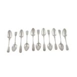 ELEVEN 19TH CENTURY FIDDLE PATTERN DESSERT SPOONS, comprising a set of five William IV Irish, Dublin